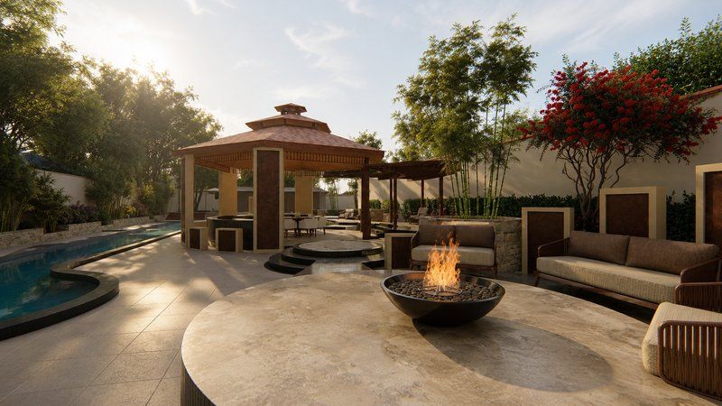 Garden pavilion with fire pit, lounge seating and curved pool at sunset