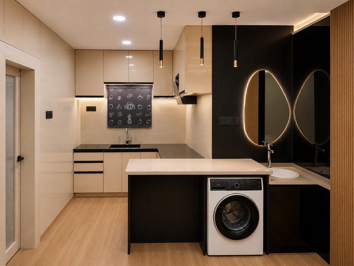 Kitchen with island counter, utility area and built-in washing machine