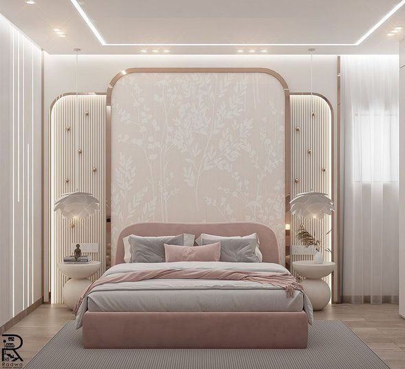 Guest bedroom with pink upholstered headboard and soft lighting